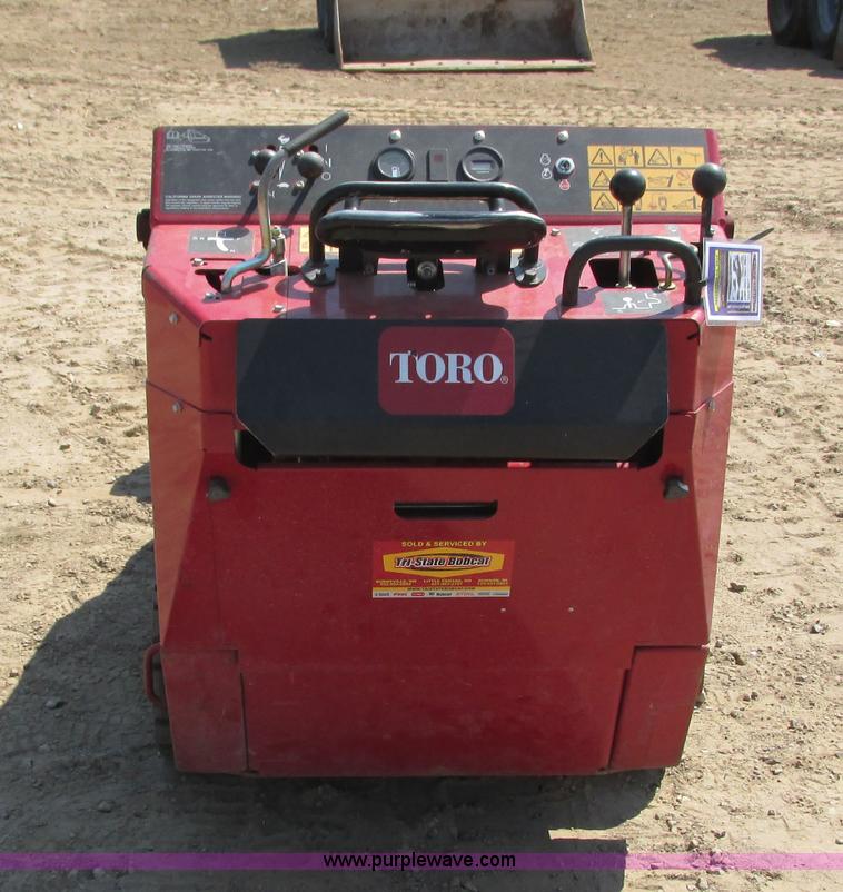 image for item K6562 2014 Toro Dingo TX427 walk behind skid steer