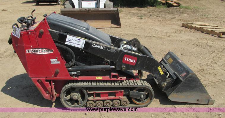 image for item K6562 2014 Toro Dingo TX427 walk behind skid steer