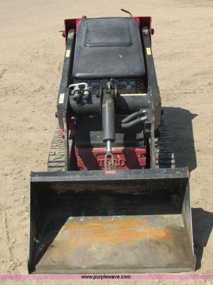 image for item K6562 2014 Toro Dingo TX427 walk behind skid steer