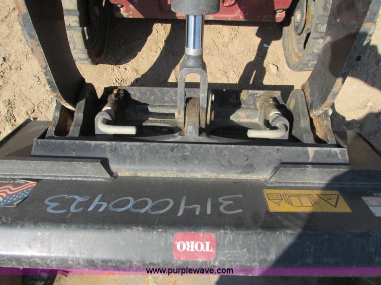 image for item K6562 2014 Toro Dingo TX427 walk behind skid steer