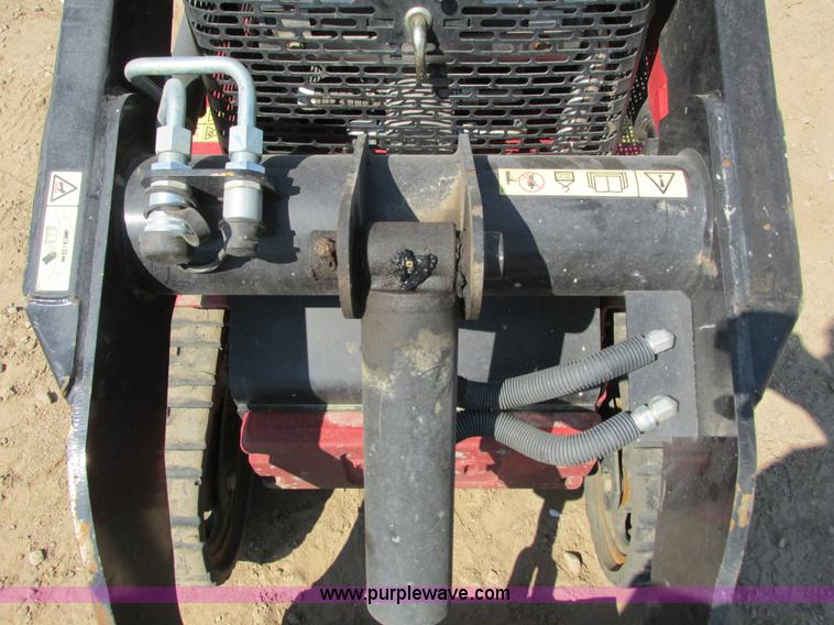 image for item K6562 2014 Toro Dingo TX427 walk behind skid steer