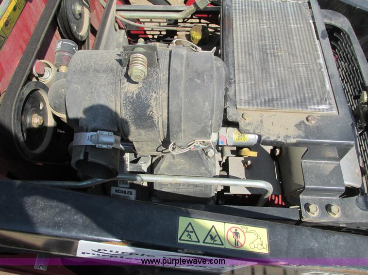 image for item K6562 2014 Toro Dingo TX427 walk behind skid steer