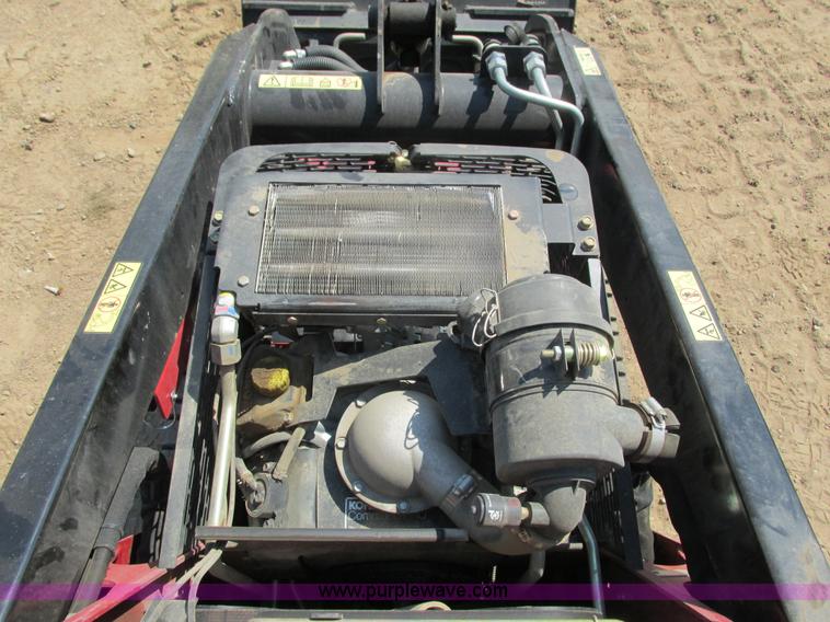 image for item K6562 2014 Toro Dingo TX427 walk behind skid steer