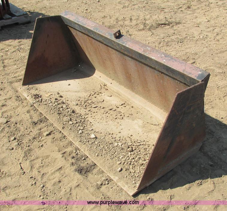 Loader bucket in Hudson, WI Item K6568 sold Purple Wave