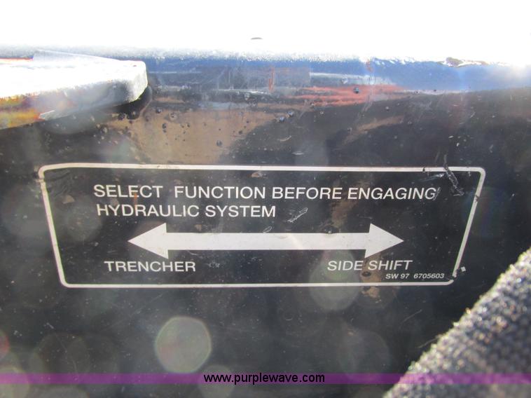 image for item K6604 Bobcat LT204 trencher skid steer attachment