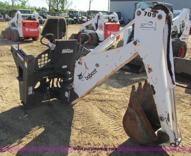 image for item K6611 Bobcat 709 backhoe skid steer attachment