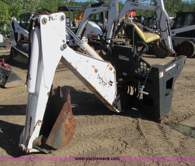 image for item K6611 Bobcat 709 backhoe skid steer attachment