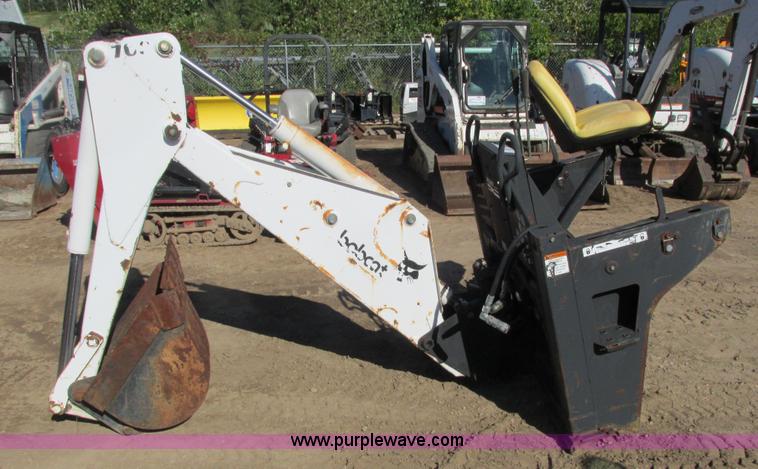 image for item K6611 Bobcat 709 backhoe skid steer attachment