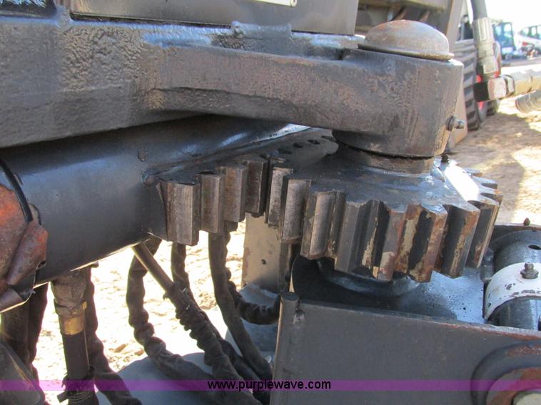 image for item K6611 Bobcat 709 backhoe skid steer attachment