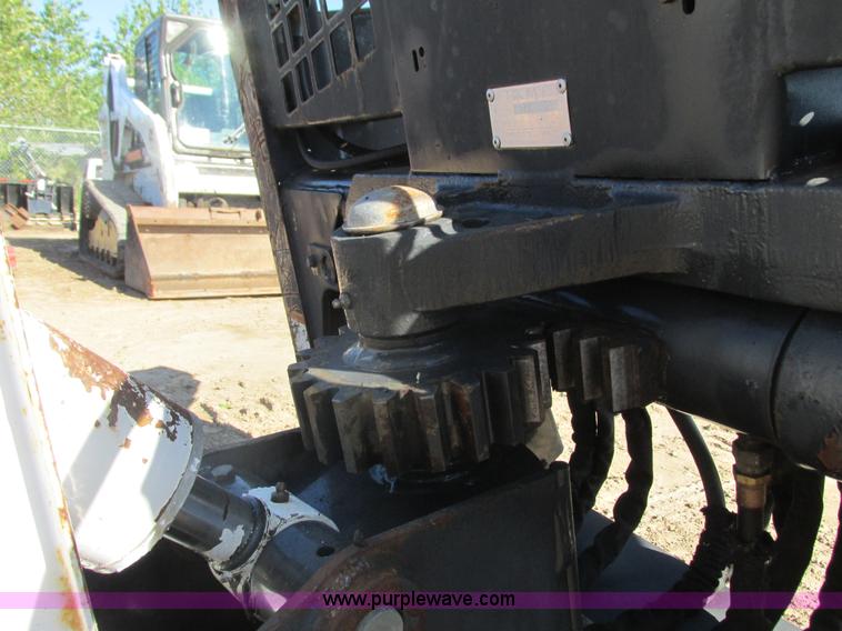 image for item K6611 Bobcat 709 backhoe skid steer attachment