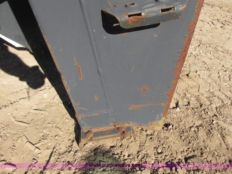 image for item K6611 Bobcat 709 backhoe skid steer attachment