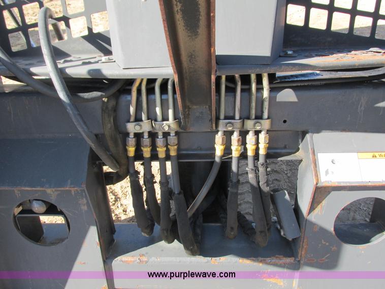 image for item K6611 Bobcat 709 backhoe skid steer attachment