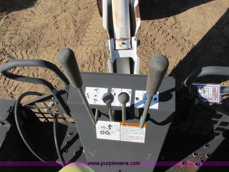 image for item K6611 Bobcat 709 backhoe skid steer attachment