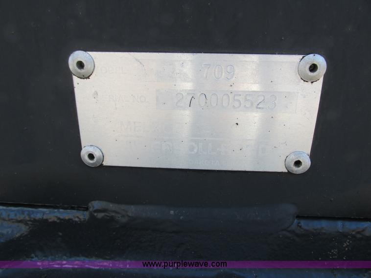 image for item K6611 Bobcat 709 backhoe skid steer attachment