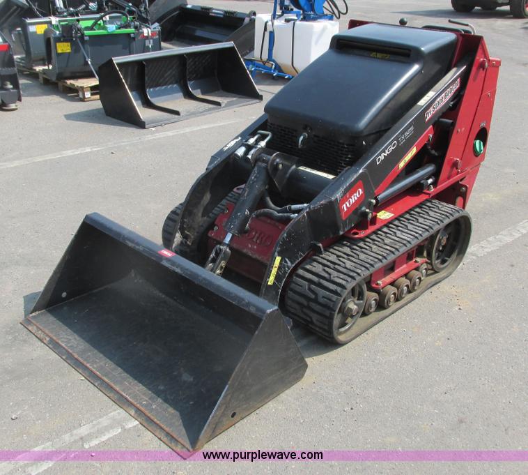 image for item K6614 2014 Toro Dingo TX-525 walk-behind skid steer