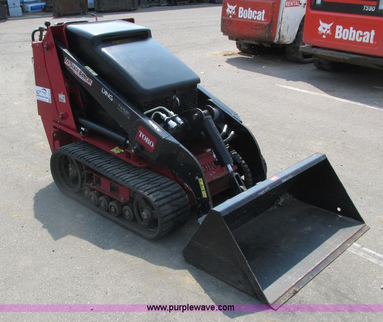 image for item K6614 2014 Toro Dingo TX-525 walk-behind skid steer