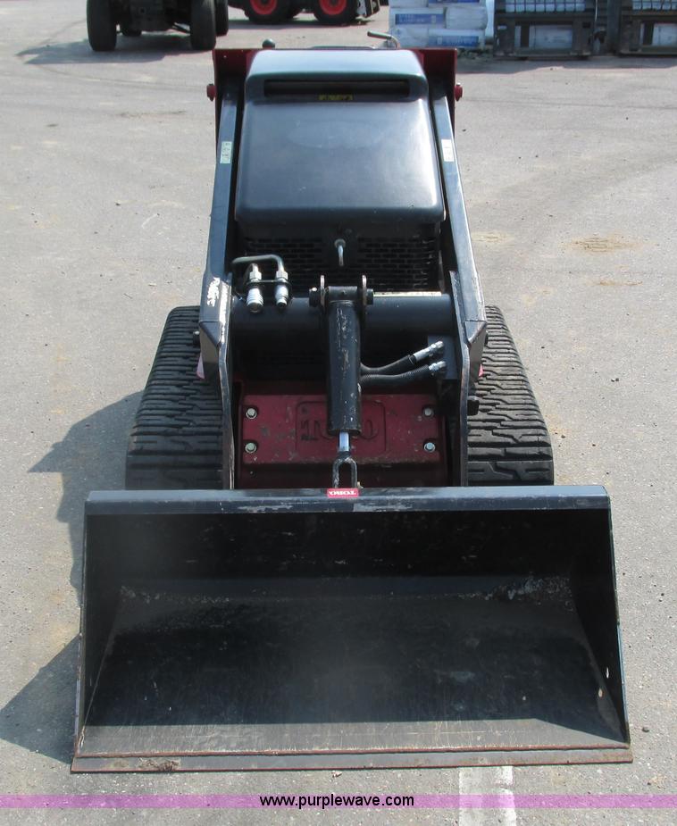 image for item K6614 2014 Toro Dingo TX-525 walk-behind skid steer