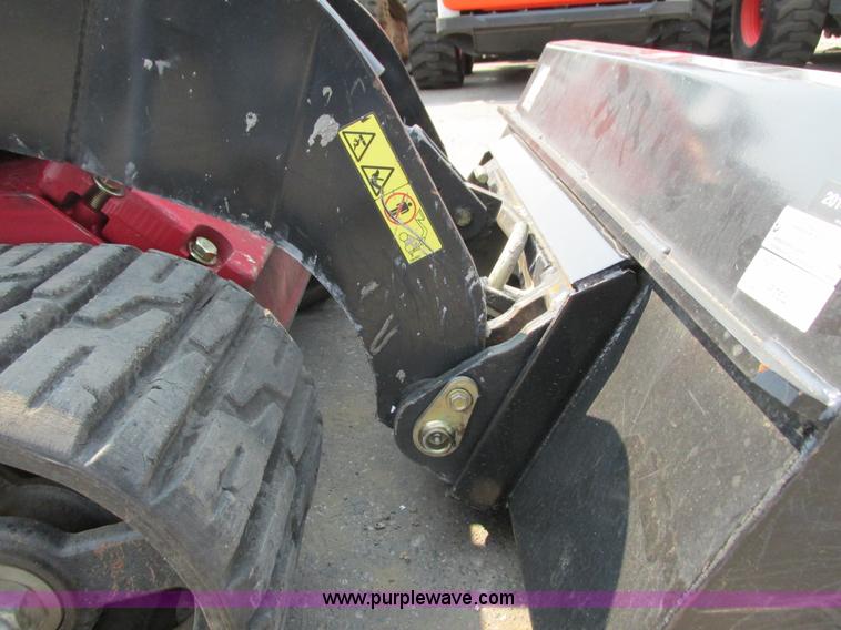 image for item K6614 2014 Toro Dingo TX-525 walk-behind skid steer