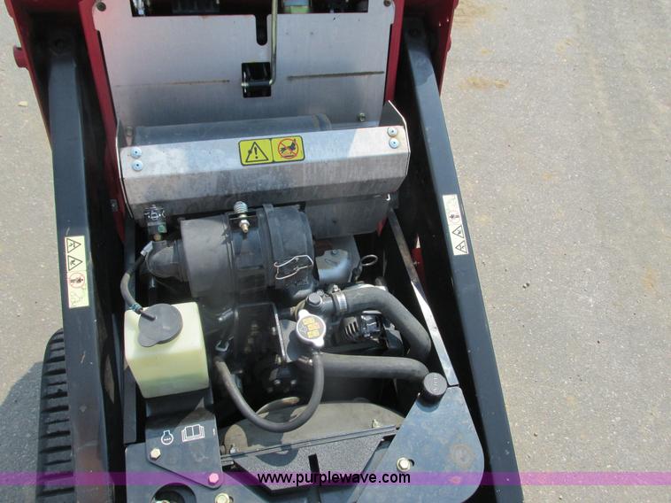 image for item K6614 2014 Toro Dingo TX-525 walk-behind skid steer