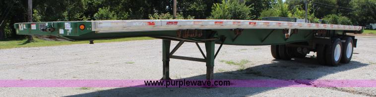 image for item J3552 2001 Great Dane GPAAR242 flatbed trailer