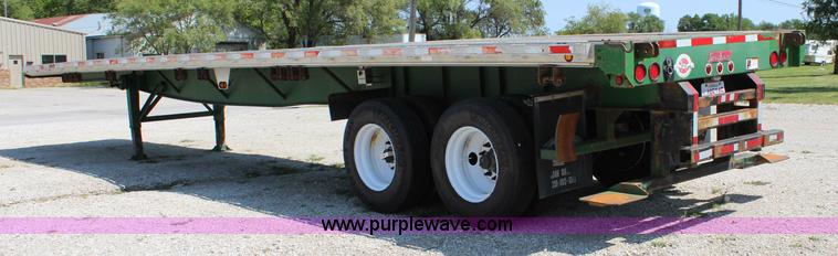 image for item J3552 2001 Great Dane GPAAR242 flatbed trailer