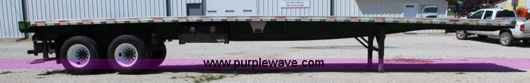 image for item J3552 2001 Great Dane GPAAR242 flatbed trailer