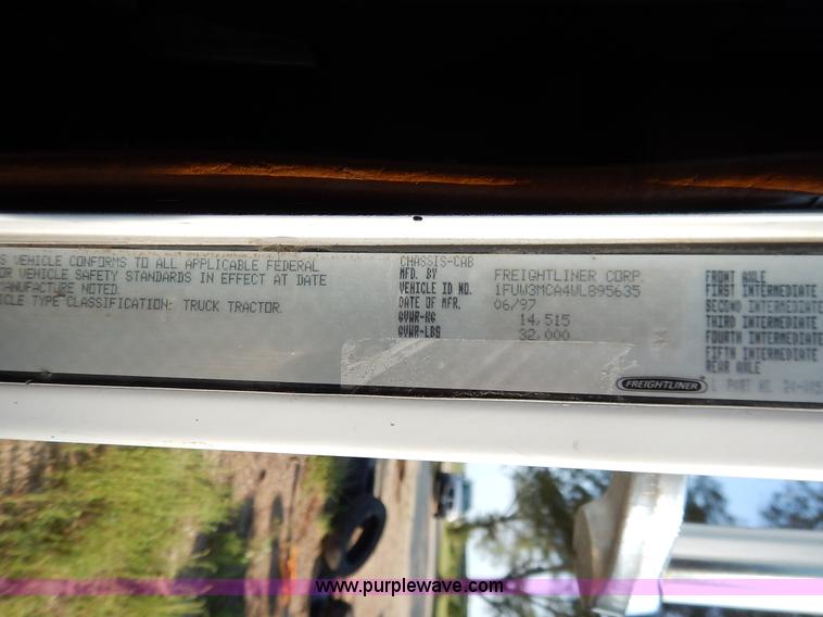 image for item J6462 1998 Freightliner FLD112 semi truck