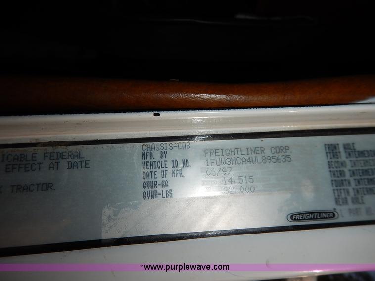 image for item J6462 1998 Freightliner FLD112 semi truck