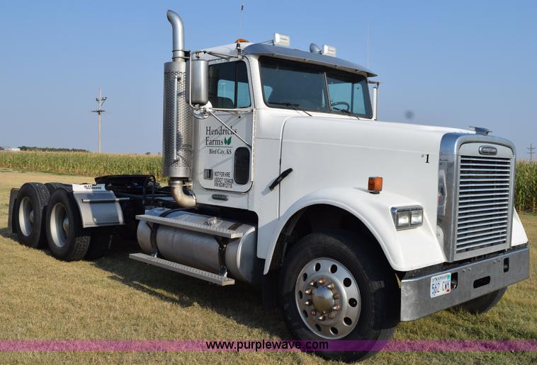 image for item L5806 2006 Freightliner FLD120SD semi truck