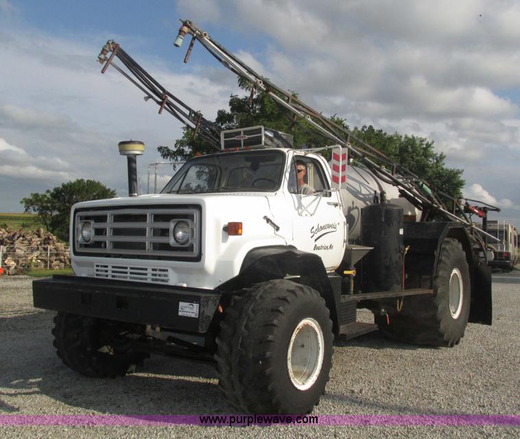 image for item H1200 GMC Sierra applicator truck