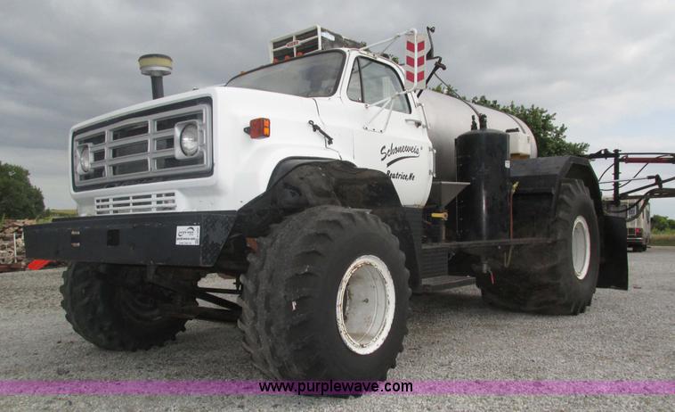 image for item H1200 GMC Sierra applicator truck