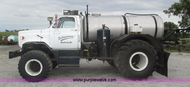 image for item H1200 GMC Sierra applicator truck