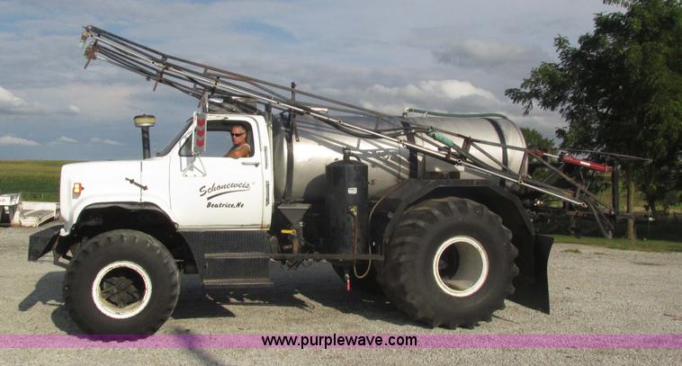 image for item H1200 GMC Sierra applicator truck