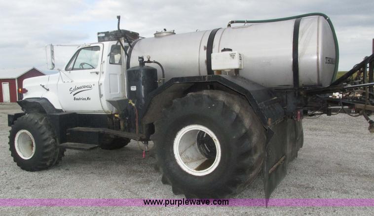 image for item H1200 GMC Sierra applicator truck