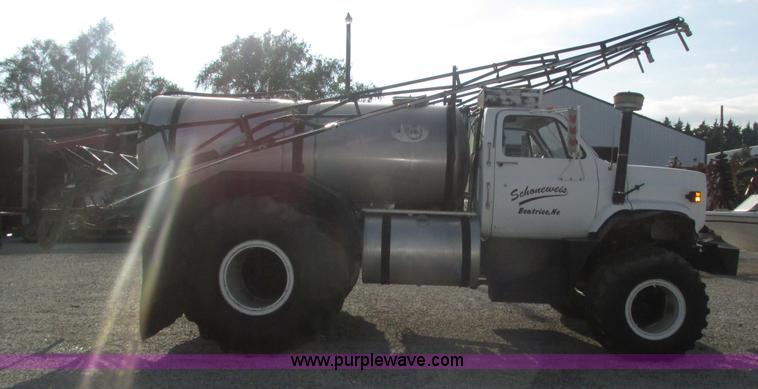 image for item H1200 GMC Sierra applicator truck