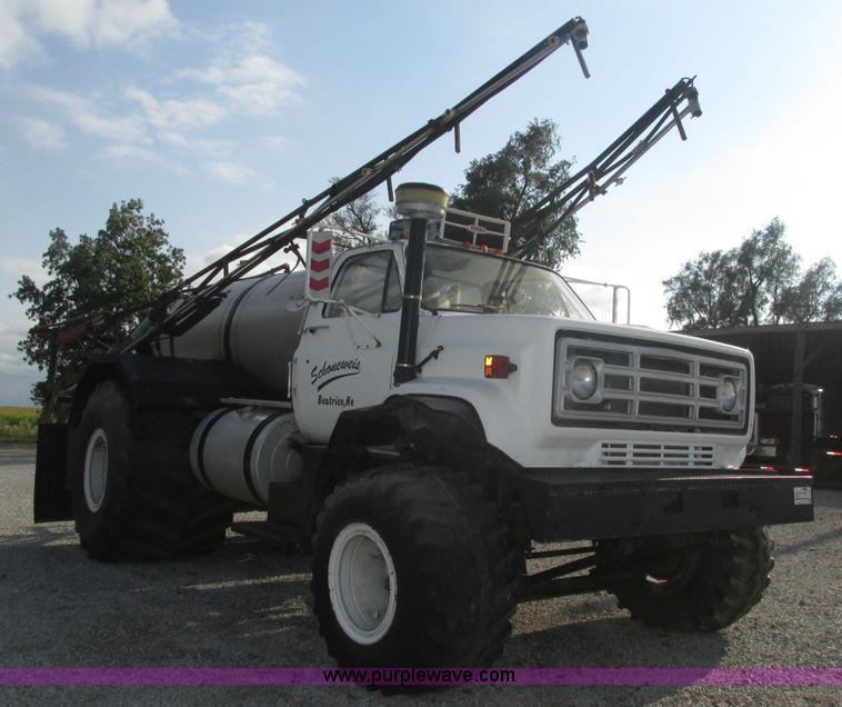 image for item H1200 GMC Sierra applicator truck