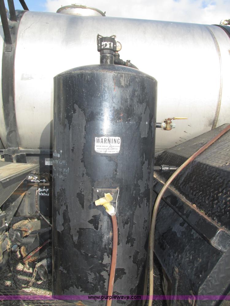 image for item H1200 GMC Sierra applicator truck