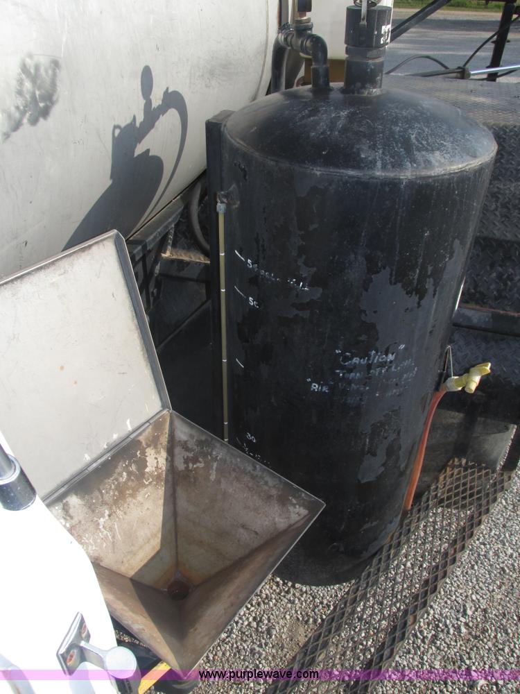 image for item H1200 GMC Sierra applicator truck