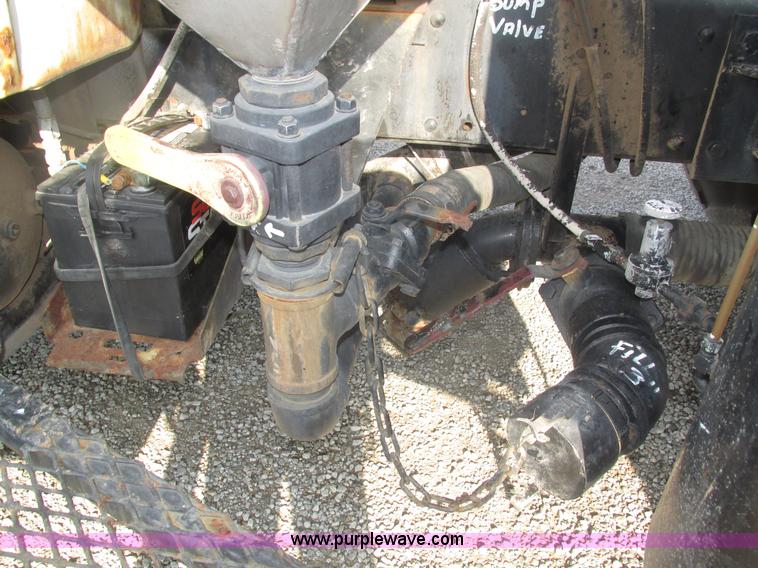 image for item H1200 GMC Sierra applicator truck