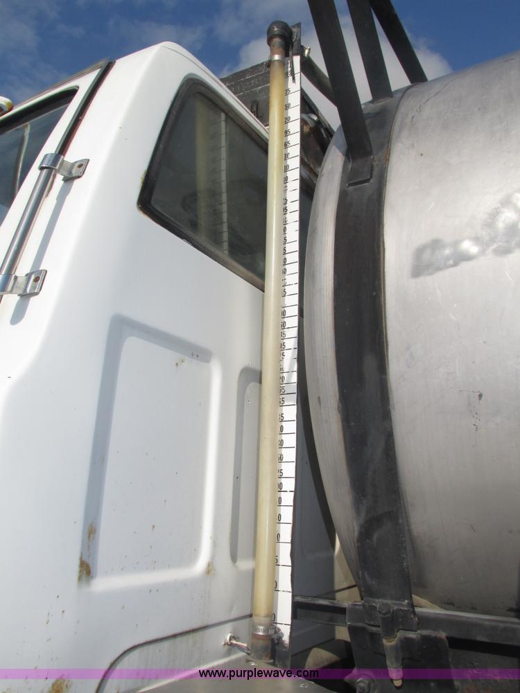 image for item H1200 GMC Sierra applicator truck