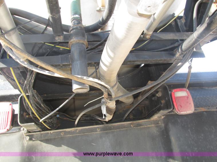 image for item H1200 GMC Sierra applicator truck