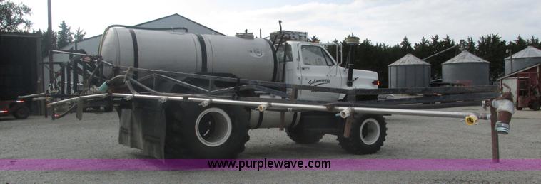 image for item H1200 GMC Sierra applicator truck