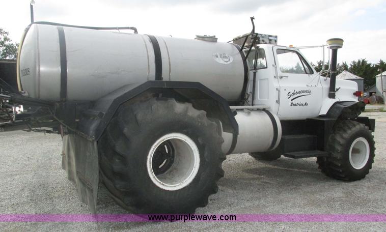 image for item H1200 GMC Sierra applicator truck