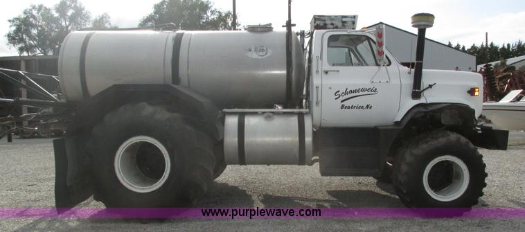 image for item H1200 GMC Sierra applicator truck