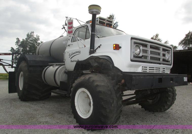 image for item H1200 GMC Sierra applicator truck