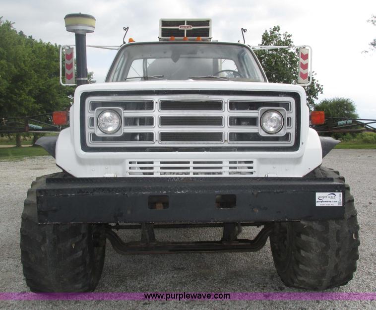 image for item H1200 GMC Sierra applicator truck