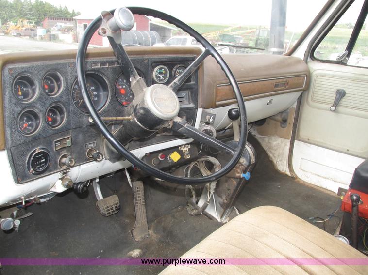 image for item H1200 GMC Sierra applicator truck