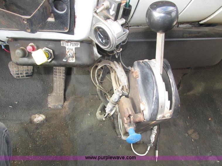 image for item H1200 GMC Sierra applicator truck