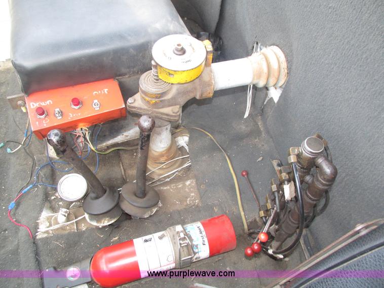 image for item H1200 GMC Sierra applicator truck