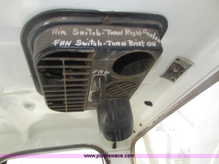 image for item H1200 GMC Sierra applicator truck